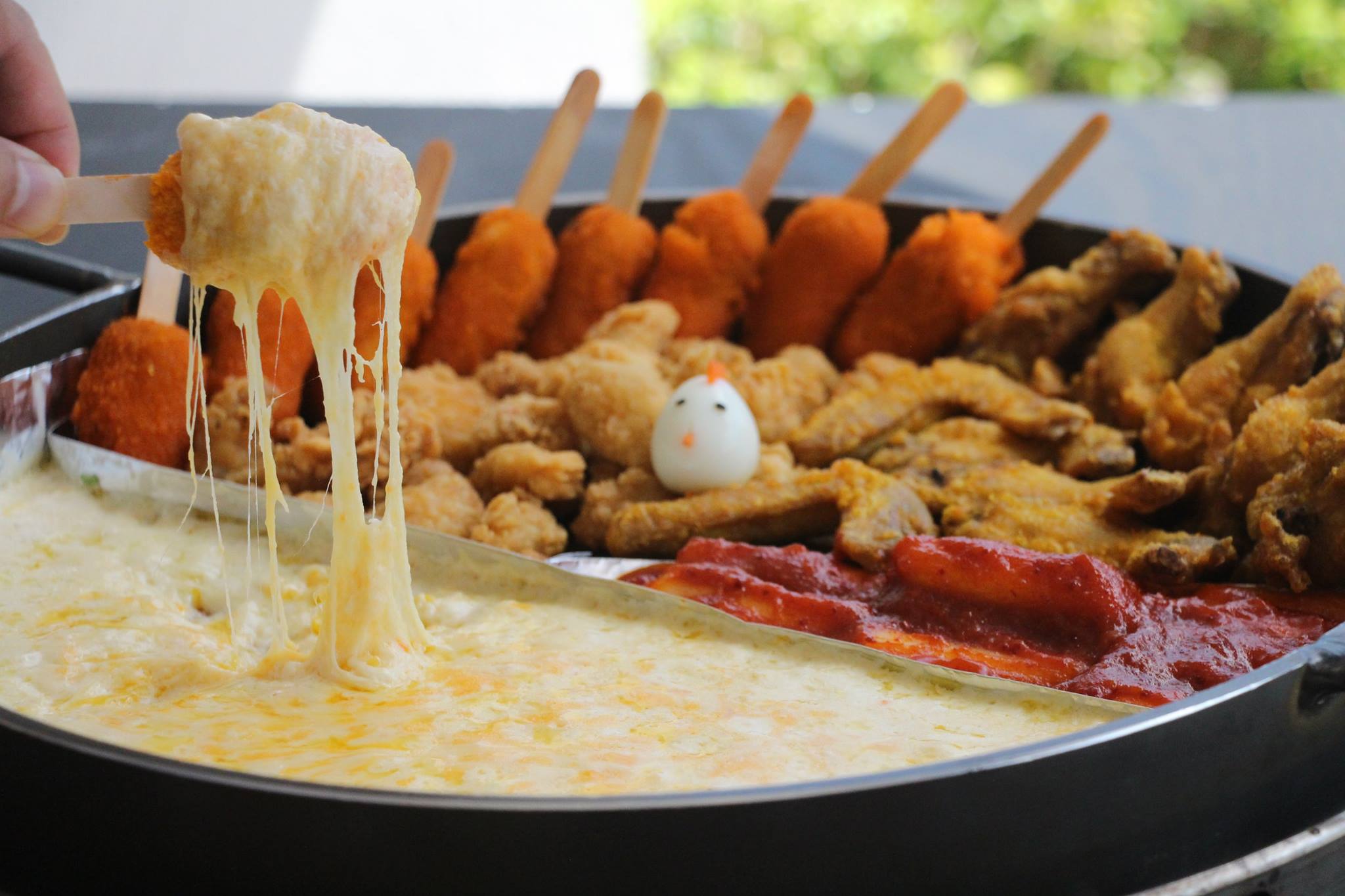 Jinggo Dakgalbi Share this picture with your cheese-loving carnivores.
